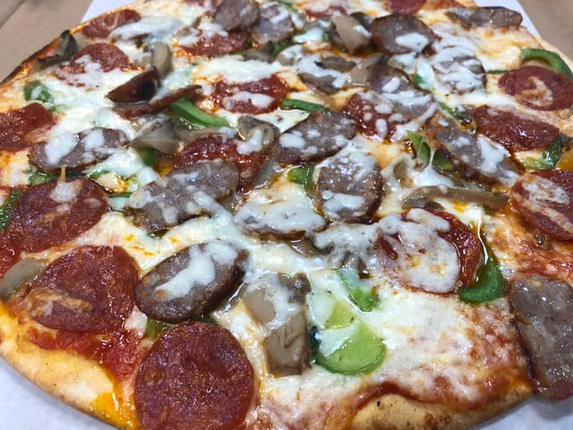 Toskana House Special Pizza.